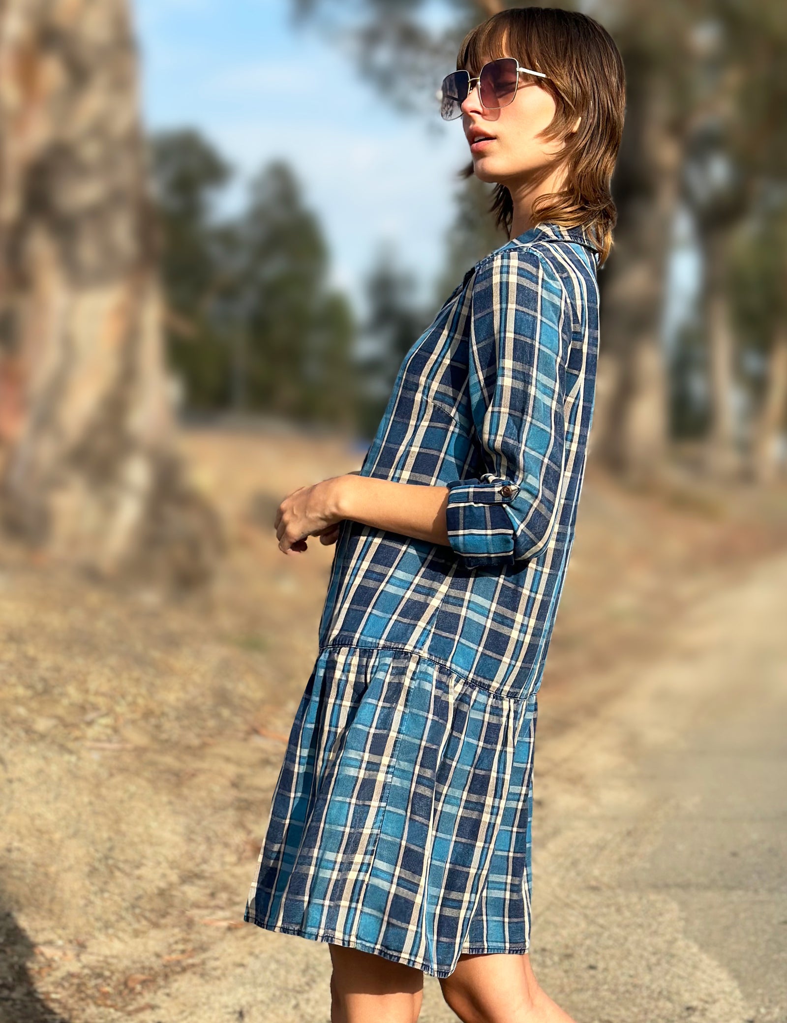 women's blue plaid dress Slip Mini The classic plaid pattern paired with the chic shift cut creates a polished look thats perfect for holiday gatherings Navy Plaid Puff Sleeve Dress